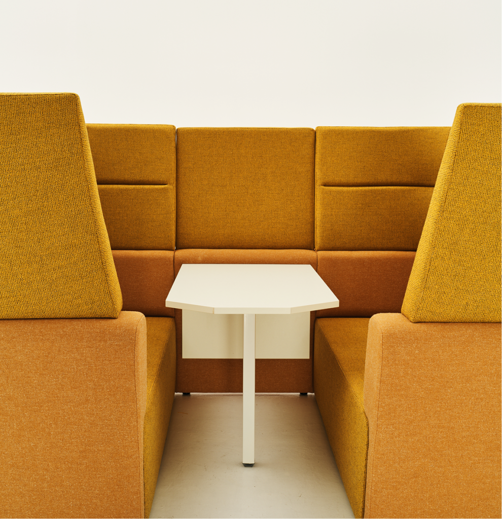 Modular breakout seating with a white meeting table