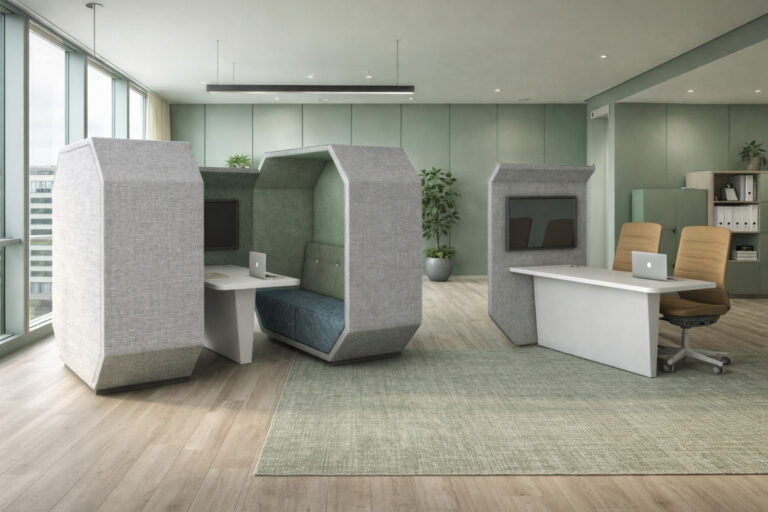 Office breakout area with two acoustic office pods and a meeting table