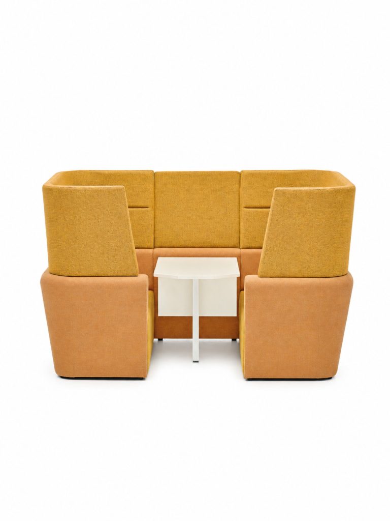 Modular breakout seating with a small table, studio shot