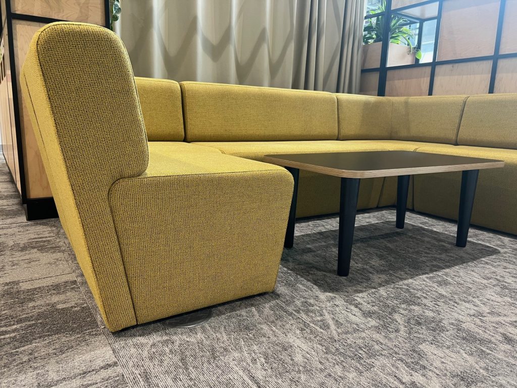 N-Ally modular breakout seating with integrated table in an office environment