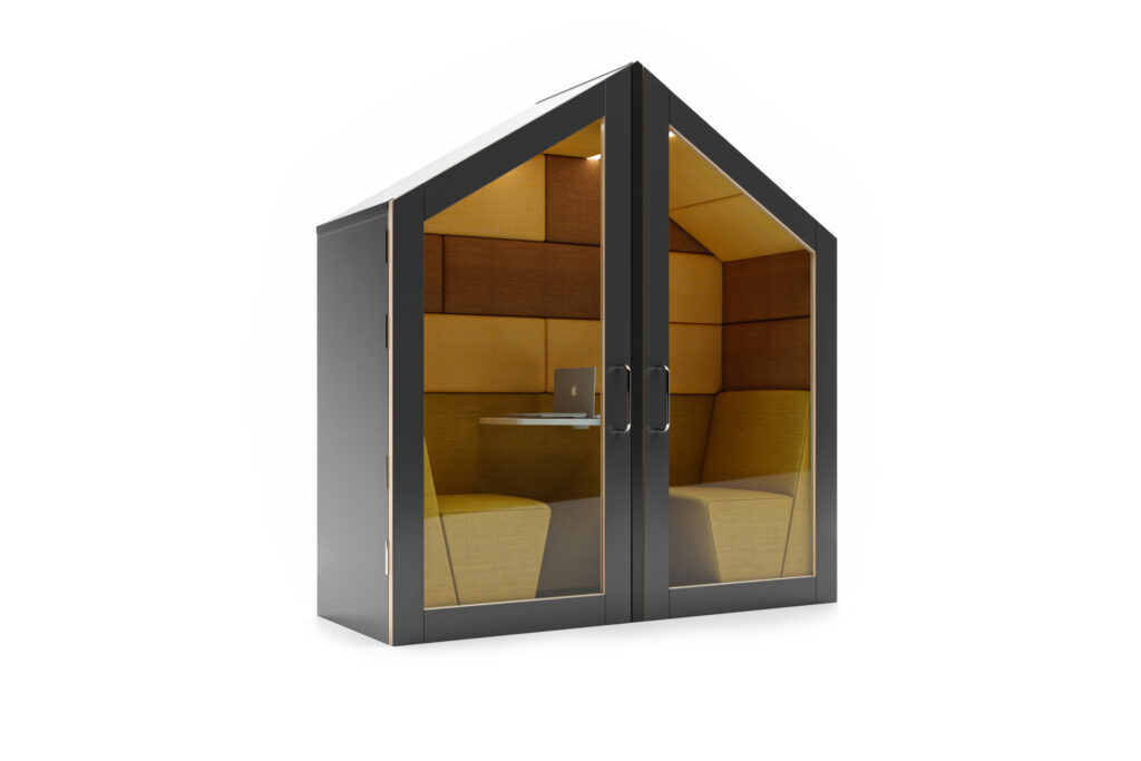 Session acoustic office pod with internal seating, table, and laptop