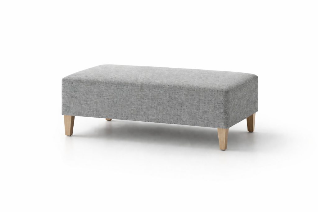 Rectangular upholstered modular breakout seating with wooden legs.