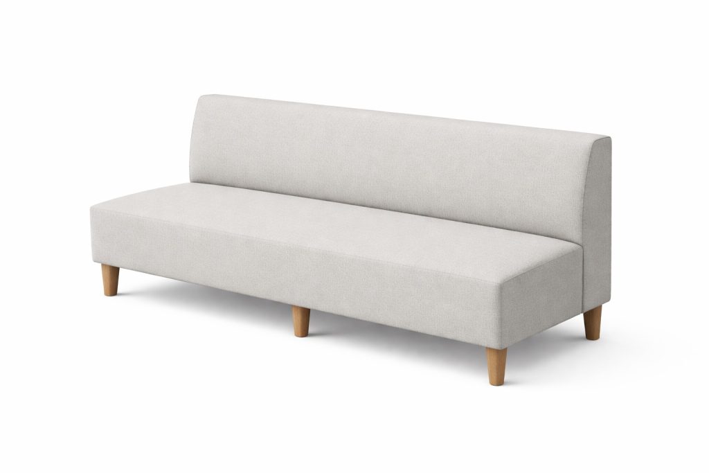 Modular breakout seating, light fabric, with wooden legs.