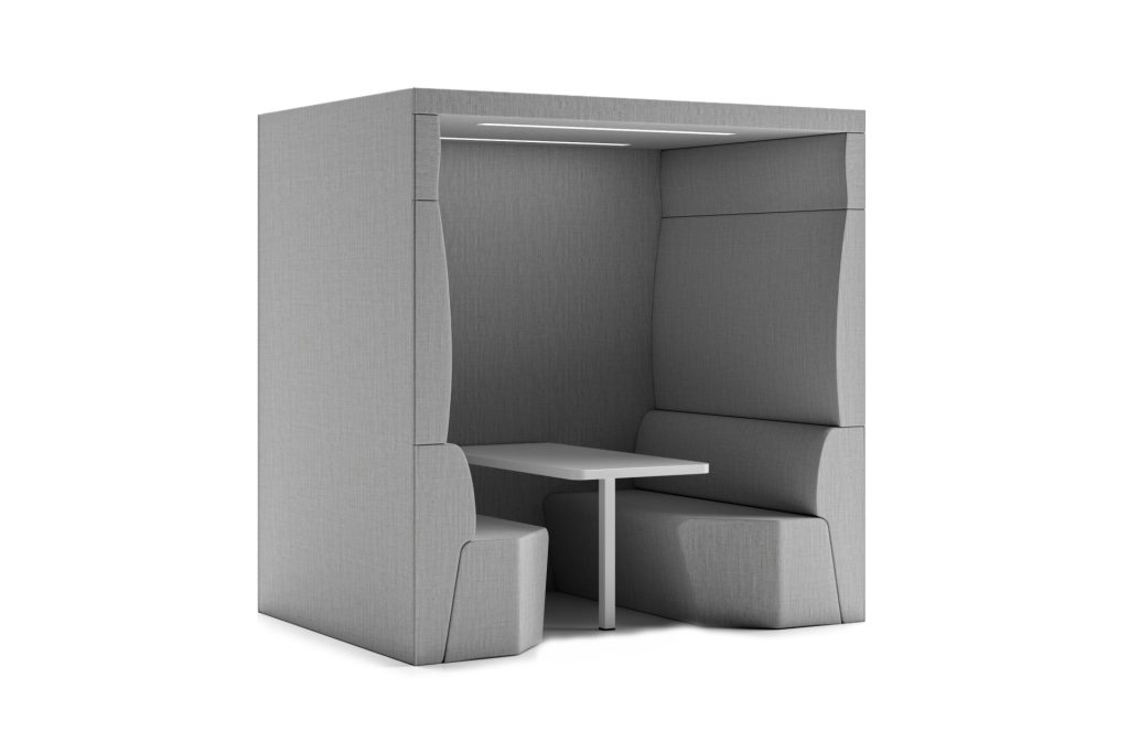 Modular acoustic office pod with integrated seating and table, and overhead lighting.