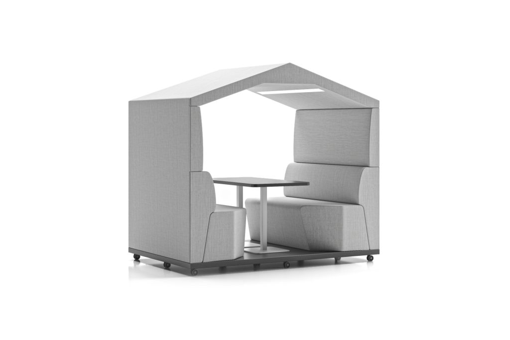 Modular breakout booth with seating, table, and pitched roof, on wheels.