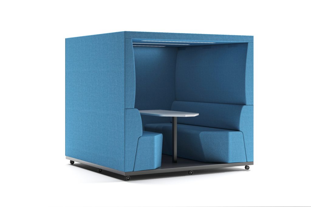 Blue acoustic office pod with internal seating and a small table, on wheels.