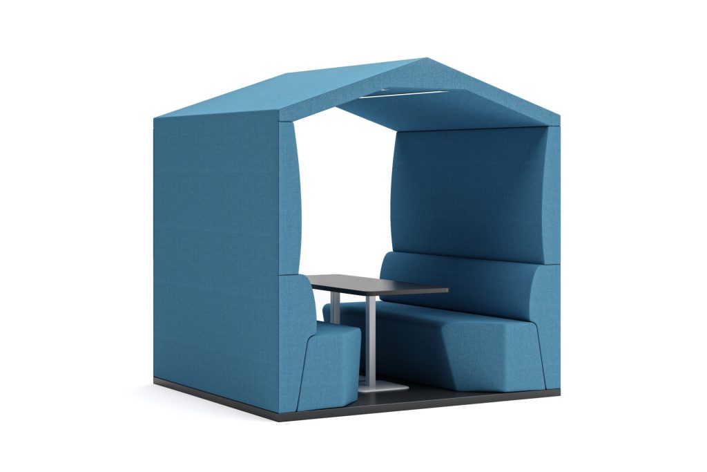 Modular breakout booth with a pitched roof, integrated seating, and a table.